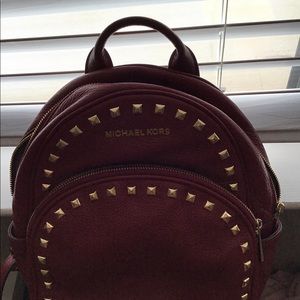 Red leather Michael Kors book bag